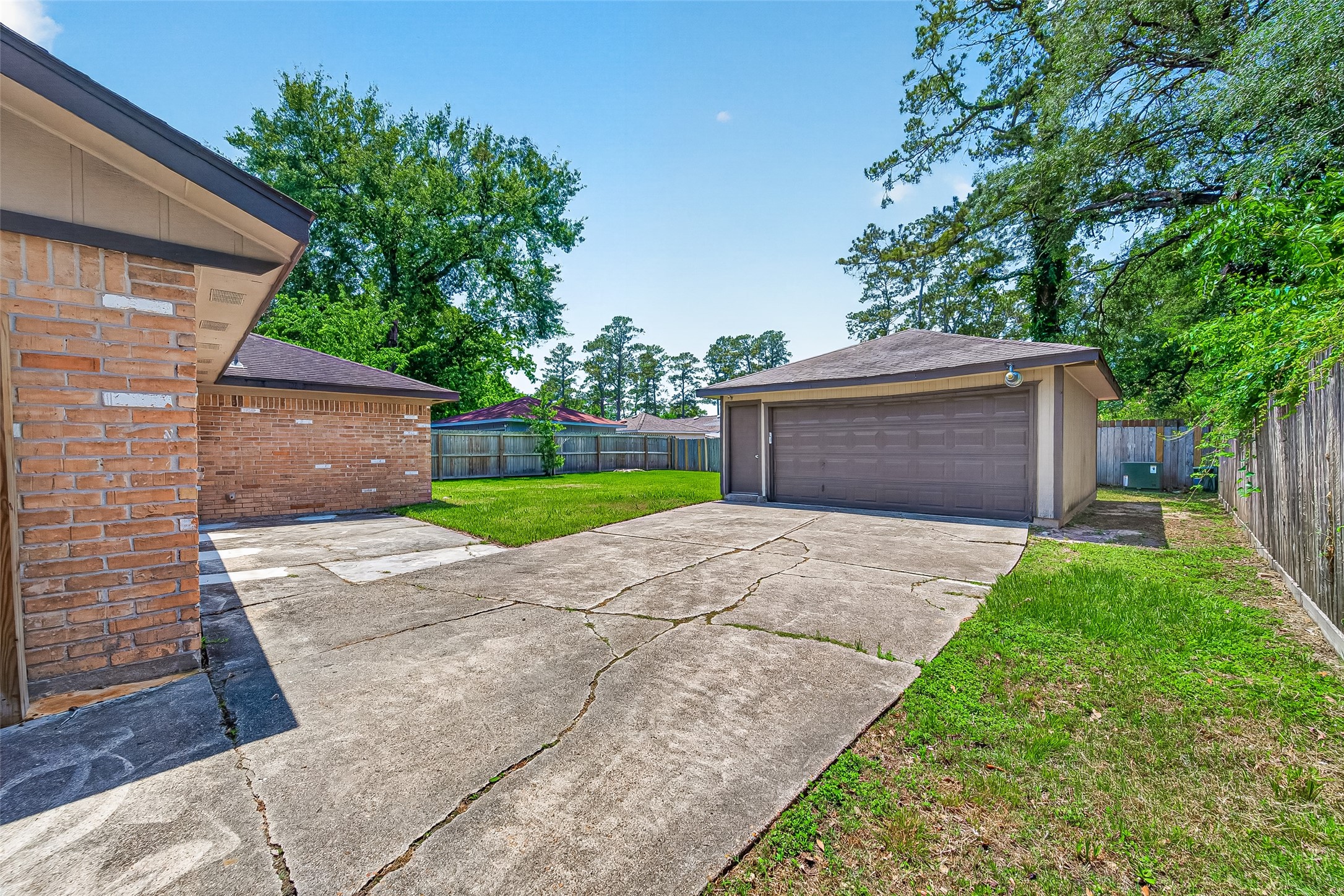 23235 Earlmist Drive Spring, TX 77373 - Photo 22 of 26 Detached garage with plenty of parking and patio space!