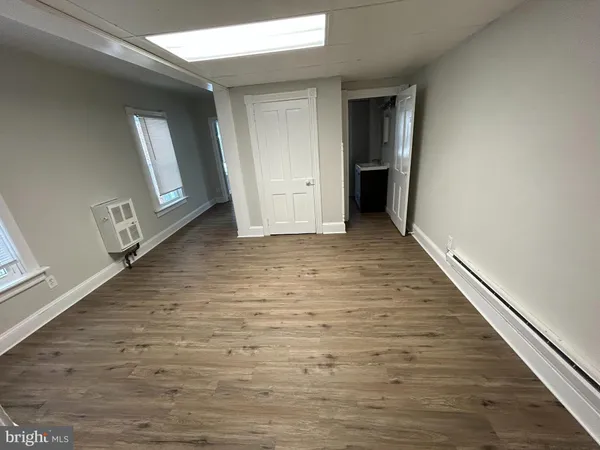 a view of an empty room and window