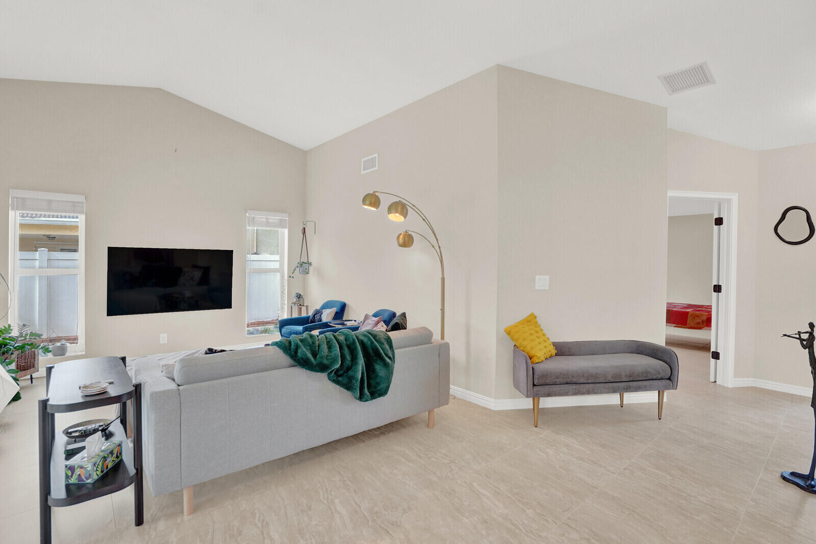 1224 Northwest 15th Street Boca Raton, FL 33486 - Photo 11 of 46 a living room with furniture and a flat screen tv