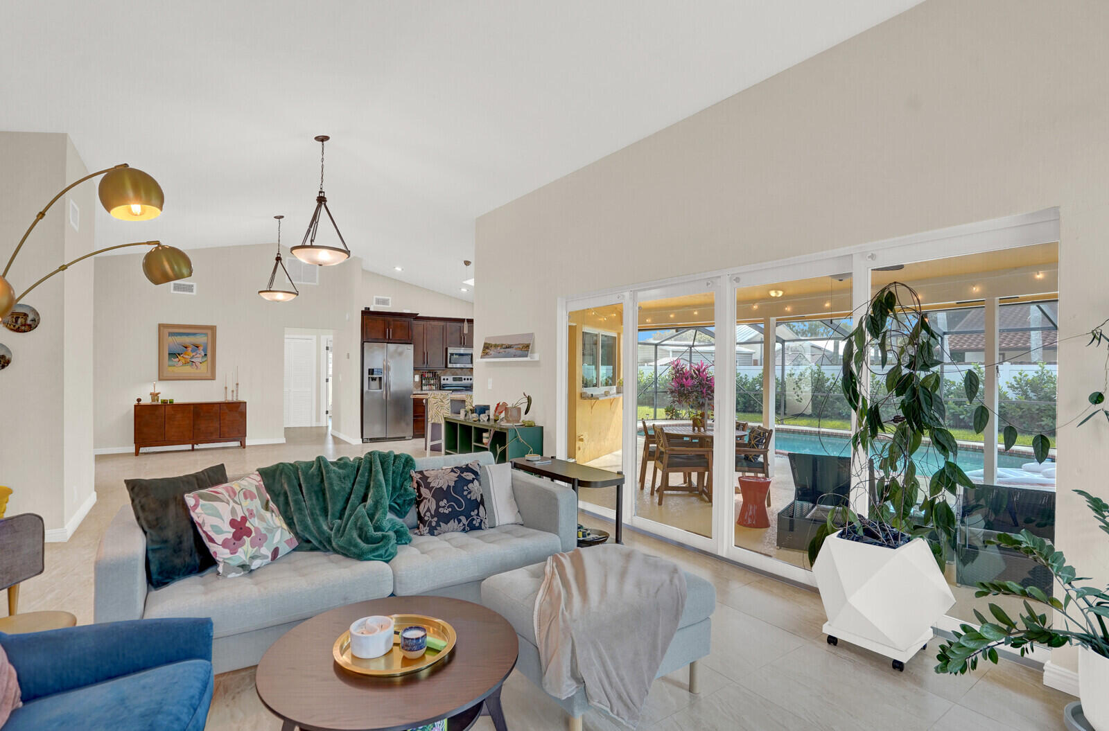 1224 Northwest 15th Street Boca Raton, FL 33486 - Photo 12 of 46 a living room with furniture and a floor to ceiling window
