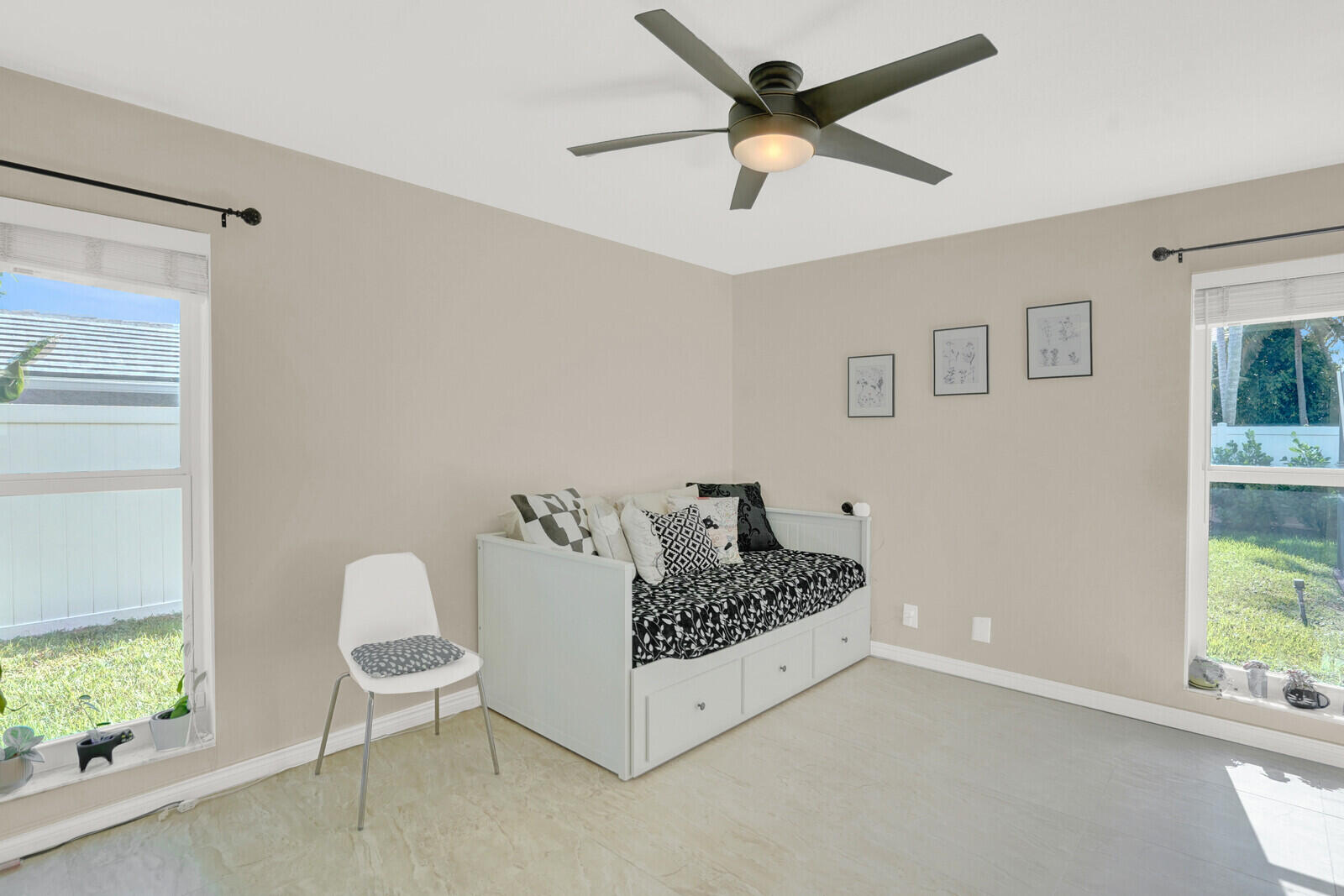 1224 Northwest 15th Street Boca Raton, FL 33486 - Photo 23 of 46 a living room with furniture and a window