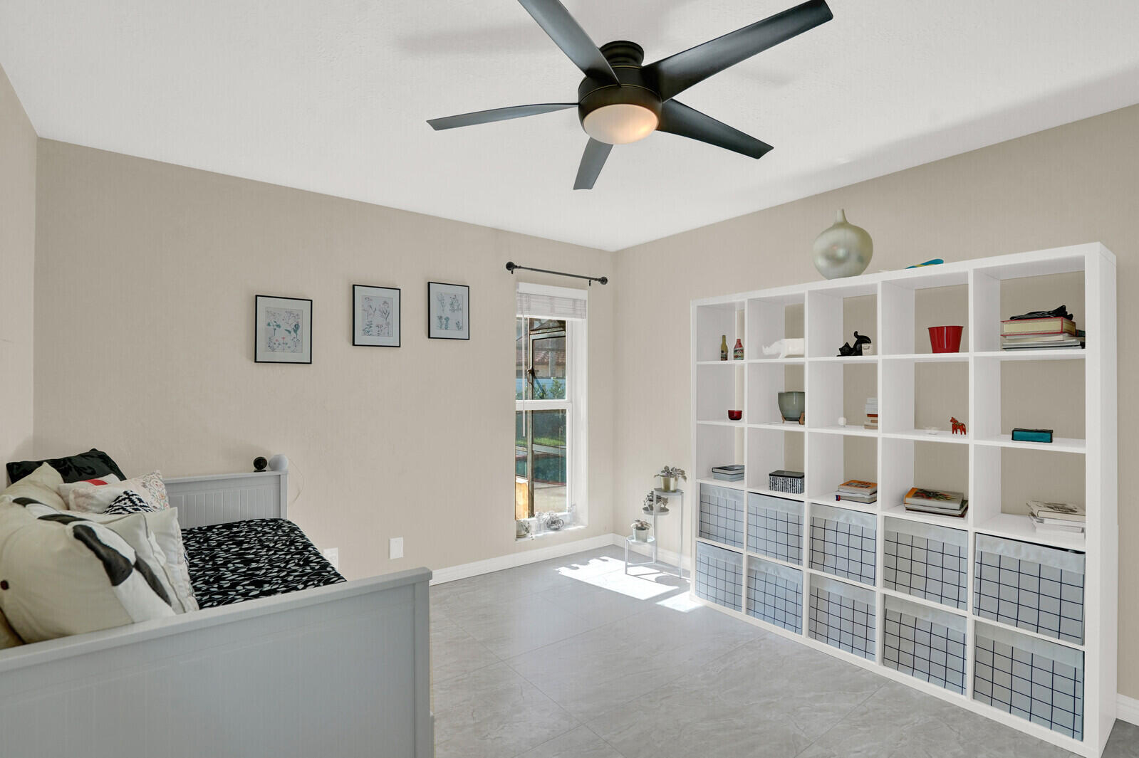 1224 Northwest 15th Street Boca Raton, FL 33486 - Photo 24 of 46 a bedroom with furniture and a window