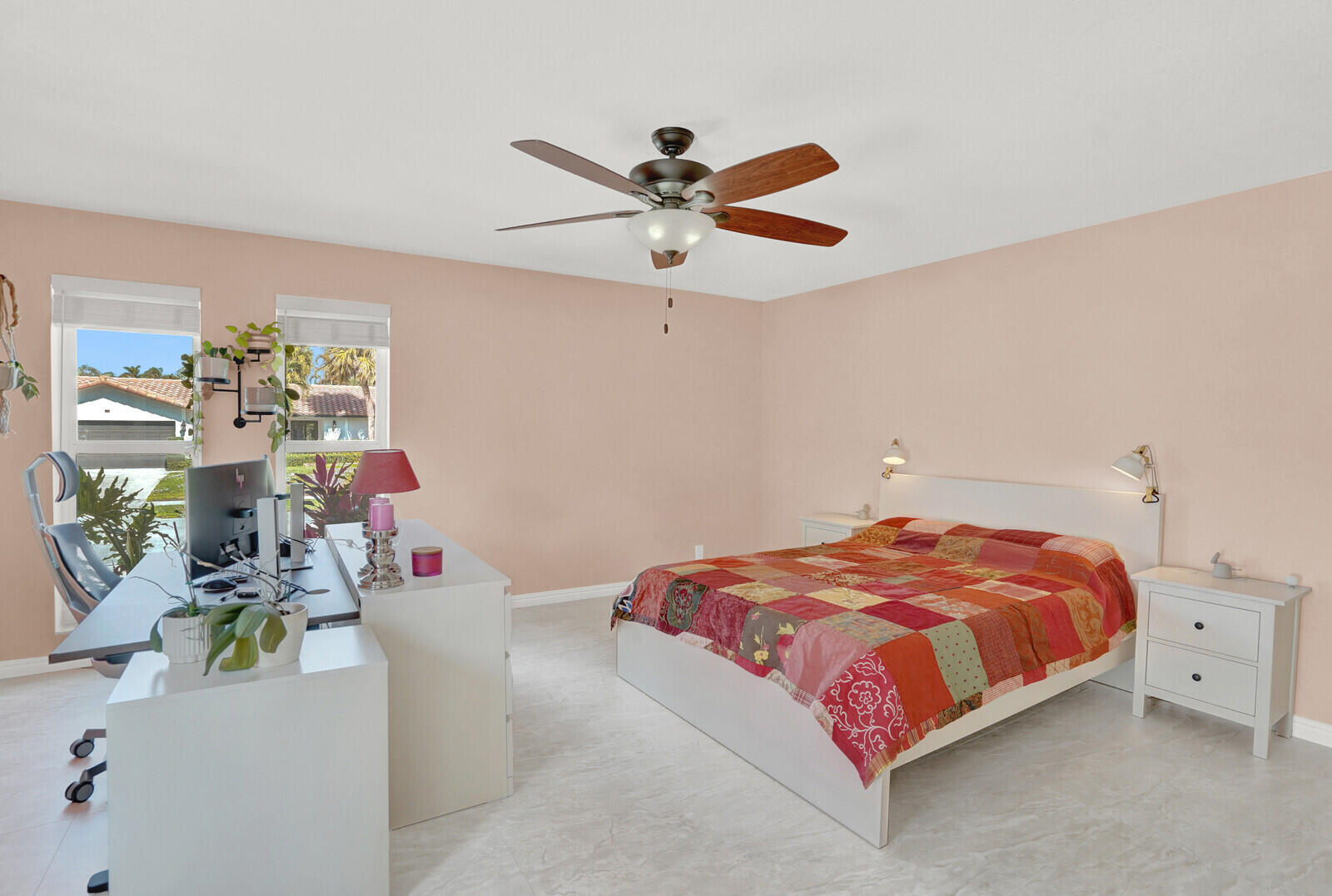 1224 Northwest 15th Street Boca Raton, FL 33486 - Photo 27 of 46 a bedroom with a bed and a window