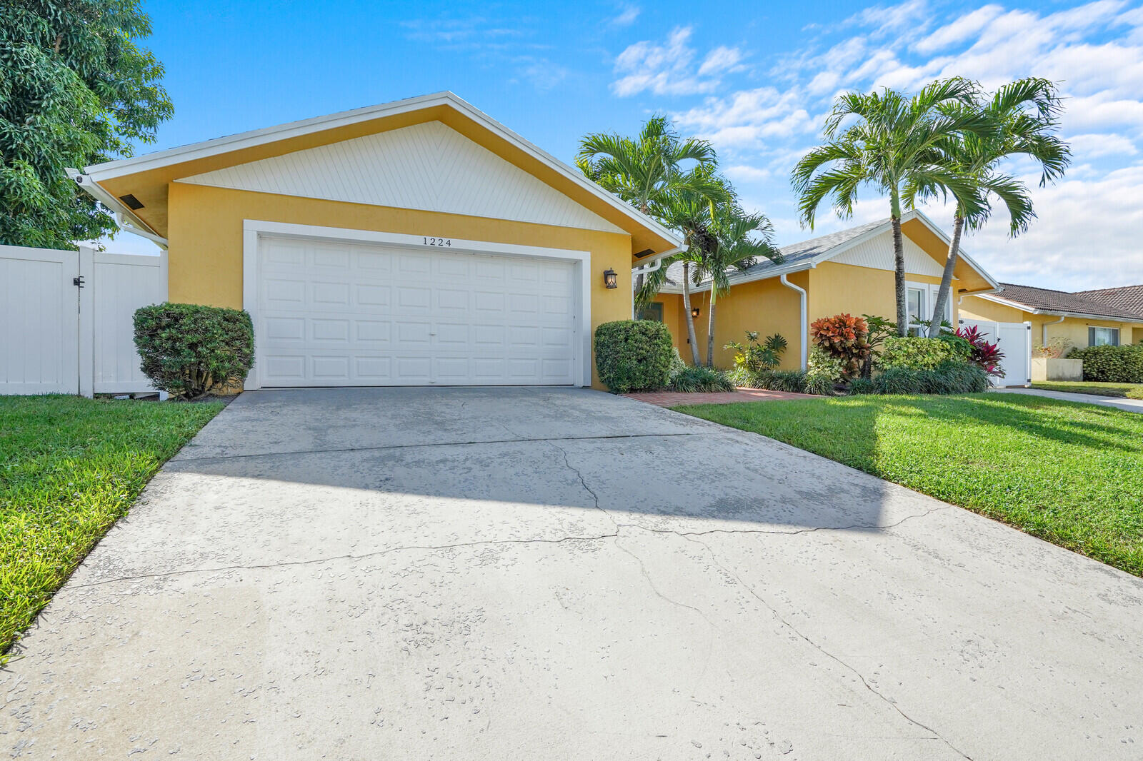 1224 Northwest 15th Street Boca Raton, FL 33486 - Photo 3 of 46 a front view of house with yard and green space