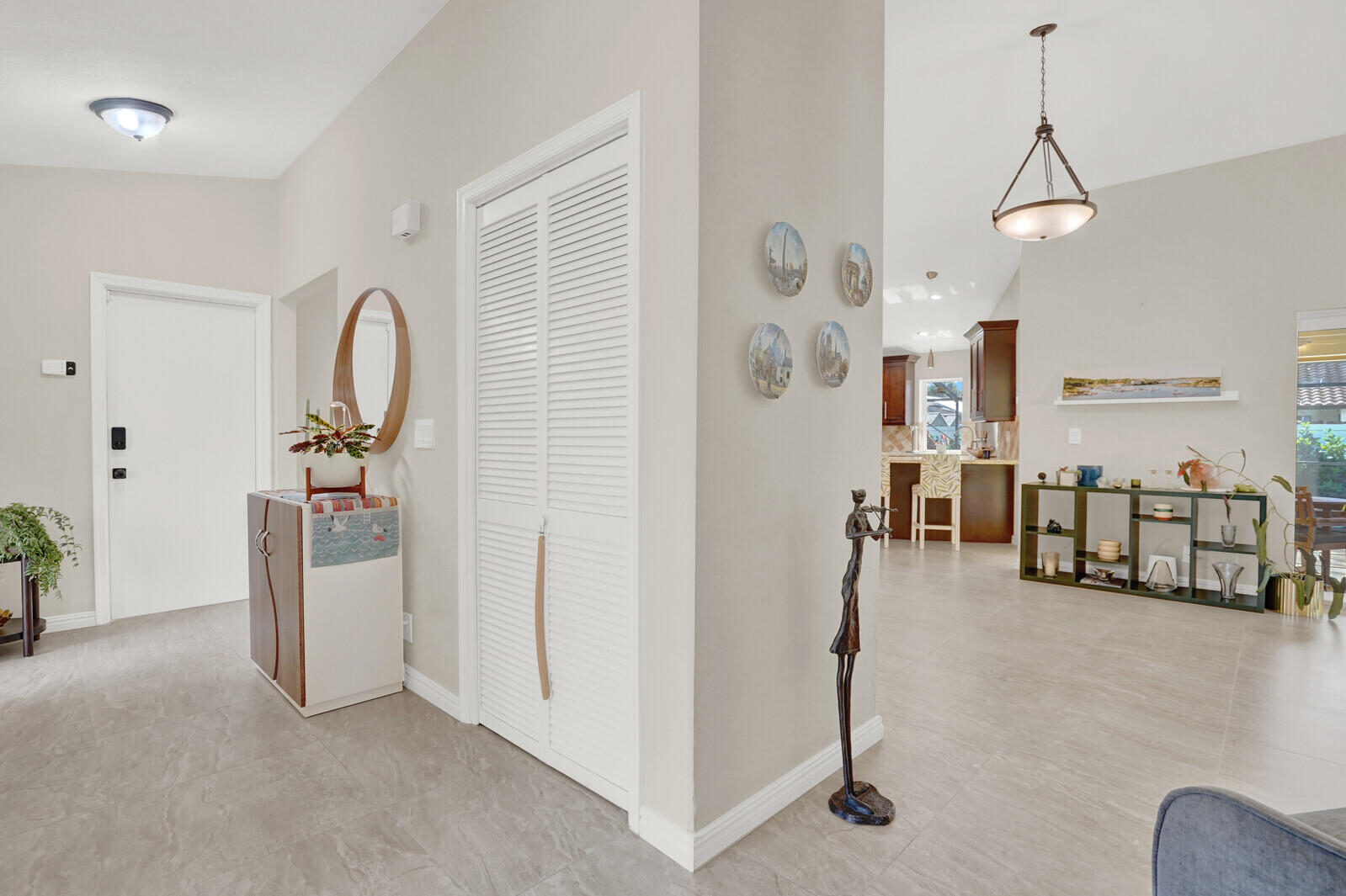 1224 Northwest 15th Street Boca Raton, FL 33486 - Photo 31 of 46 a view of a livingroom with furniture and floor to ceiling window