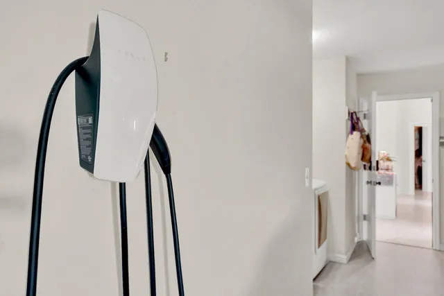 a view of a patio with a table and chairs