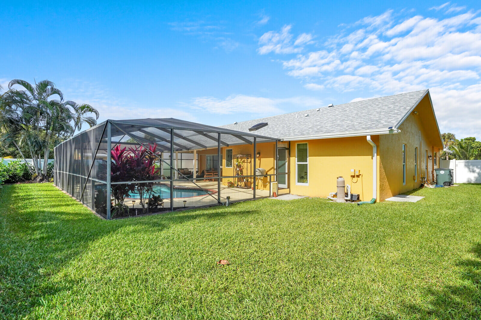 1224 Northwest 15th Street Boca Raton, FL 33486 - Photo 44 of 46 a view of a house with a big yard and potted plants