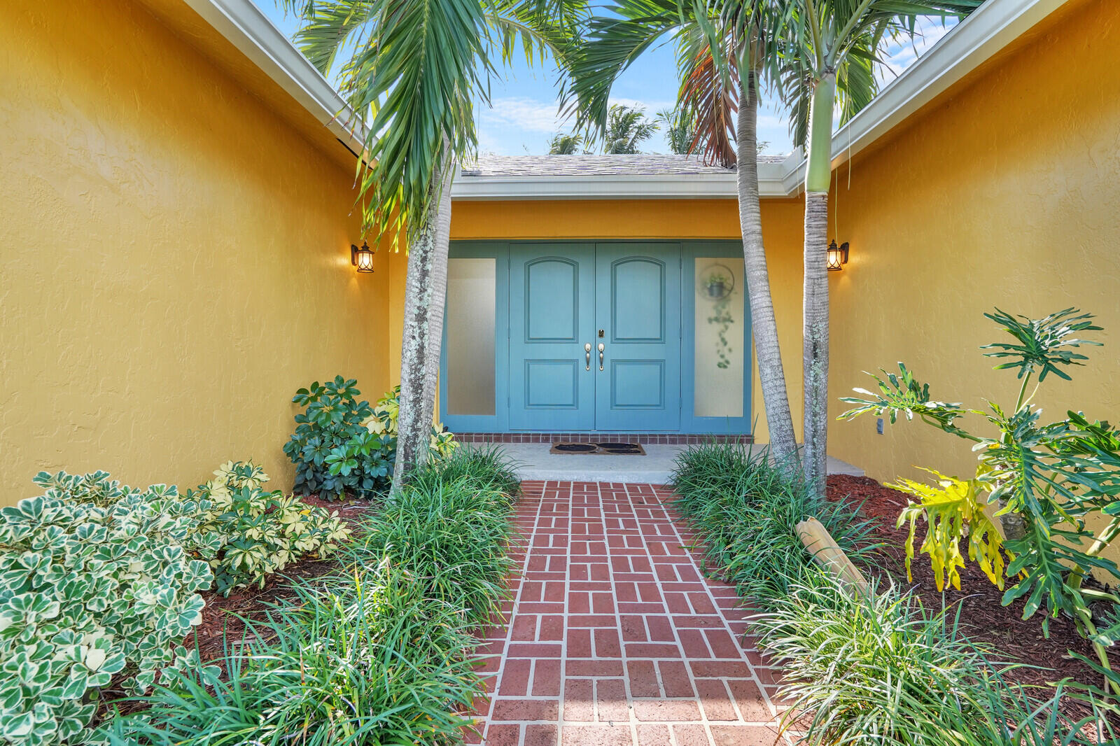 1224 Northwest 15th Street Boca Raton, FL 33486 - Photo 6 of 46 a front view of a house with a yard