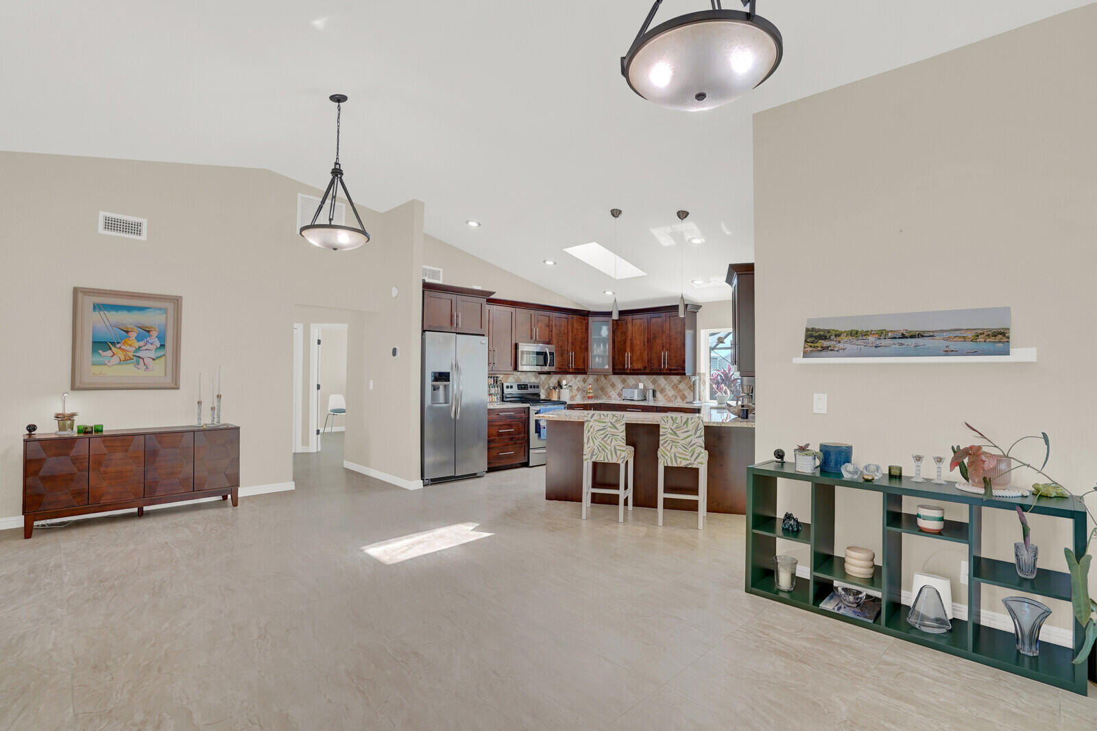 1224 Northwest 15th Street Boca Raton, FL 33486 - Photo 9 of 46 a open kitchen with cabinets a sink and appliances