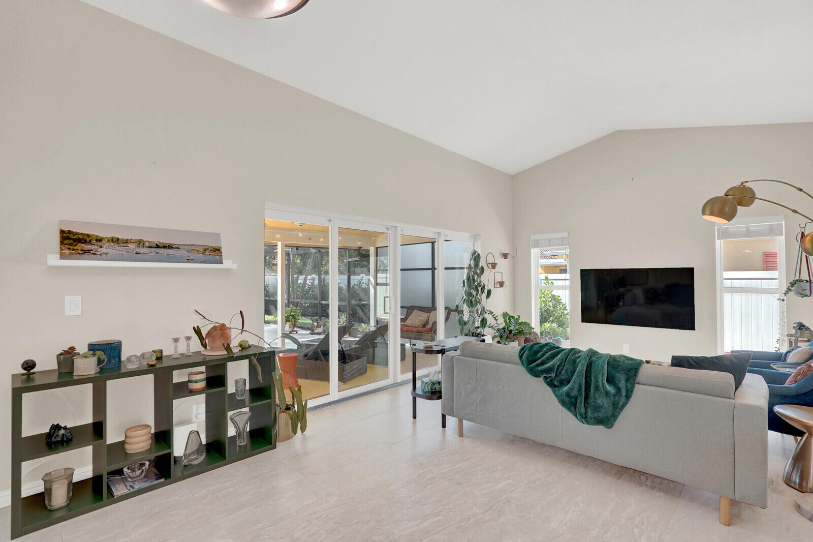1224 Northwest 15th Street Boca Raton, FL 33486 - Photo 10 of 46 a living room with furniture and a flat screen tv