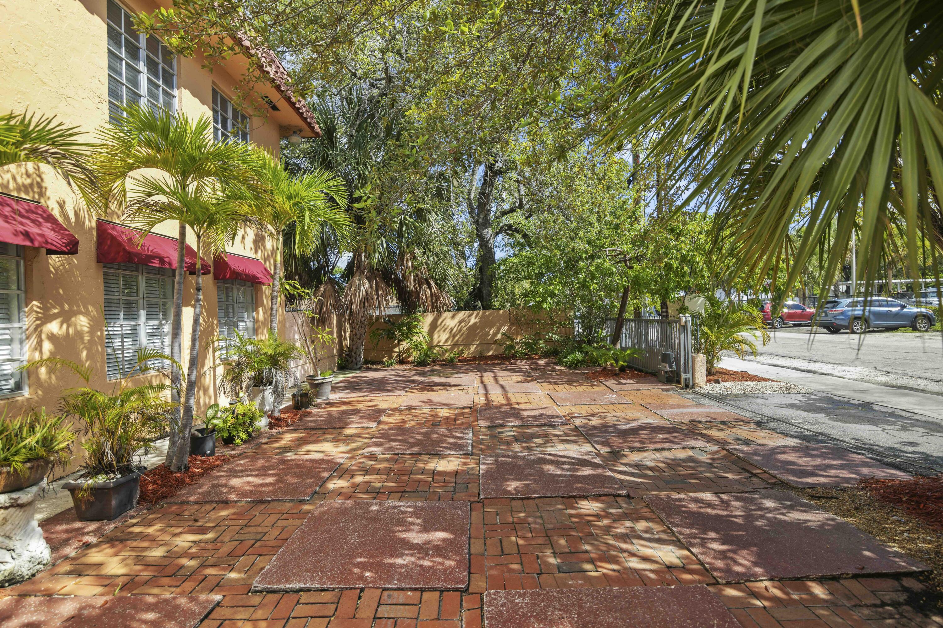 1545 Miami Road Fort Lauderdale, FL 33316 - Photo 11 of 39 a street view with retail shops