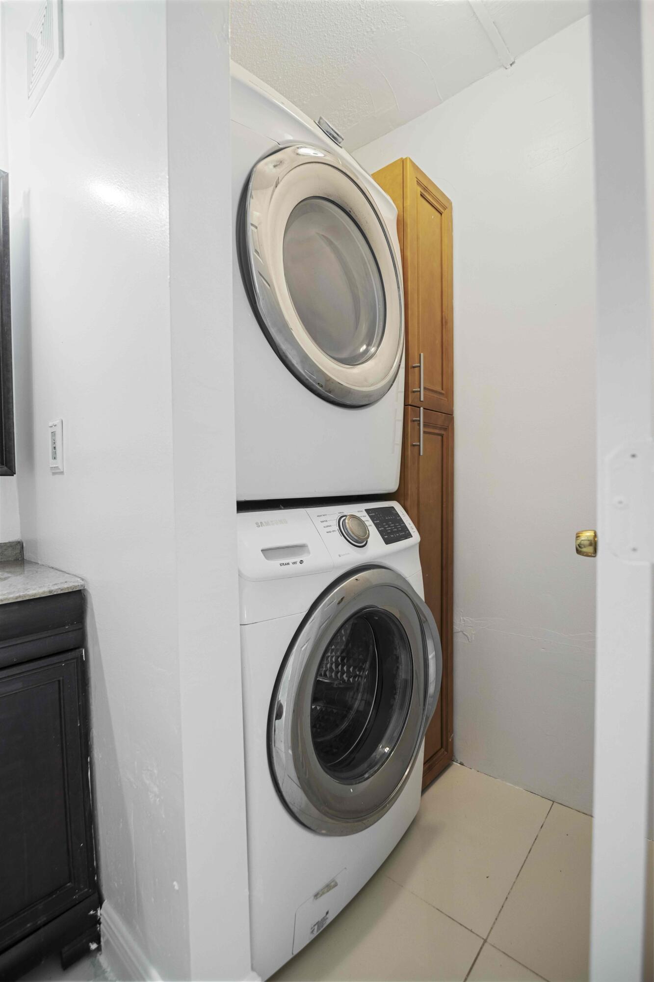 1545 Miami Road Fort Lauderdale, FL 33316 - Photo 17 of 39 a utility room with dryer and washer