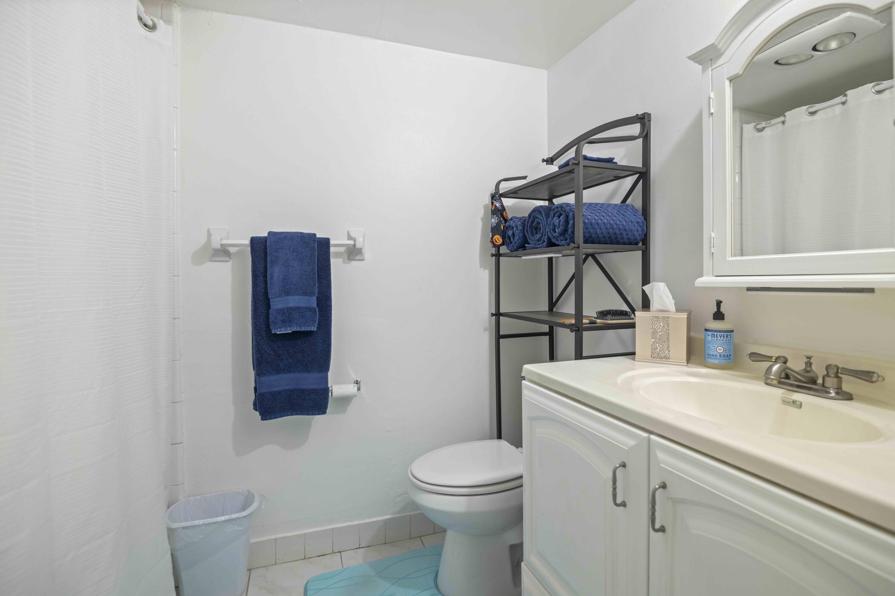 1545 Miami Road Fort Lauderdale, FL 33316 - Photo 25 of 39 a bathroom with a toilet sink and mirror