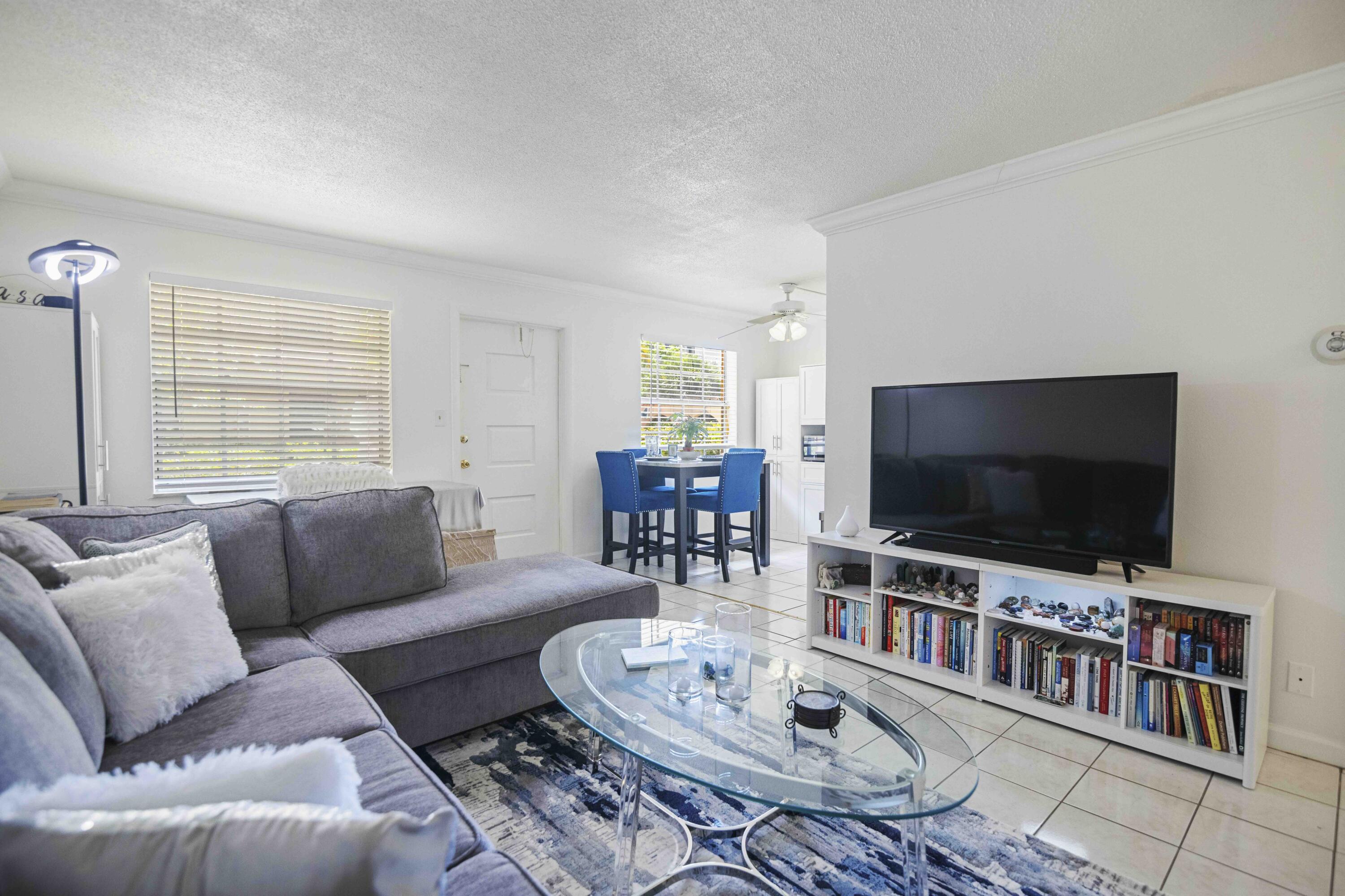 1545 Miami Road Fort Lauderdale, FL 33316 - Photo 27 of 39 a living room with furniture and a flat screen tv