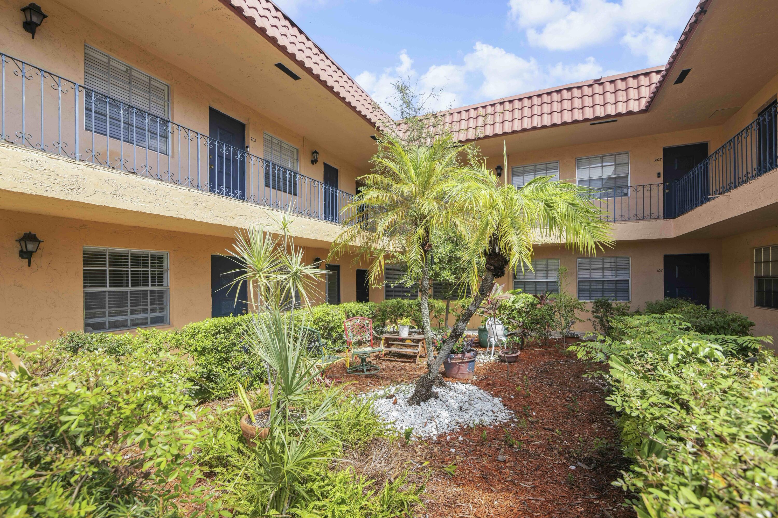 1545 Miami Road Fort Lauderdale, FL 33316 - Photo 3 of 39 a view of a house with a yard
