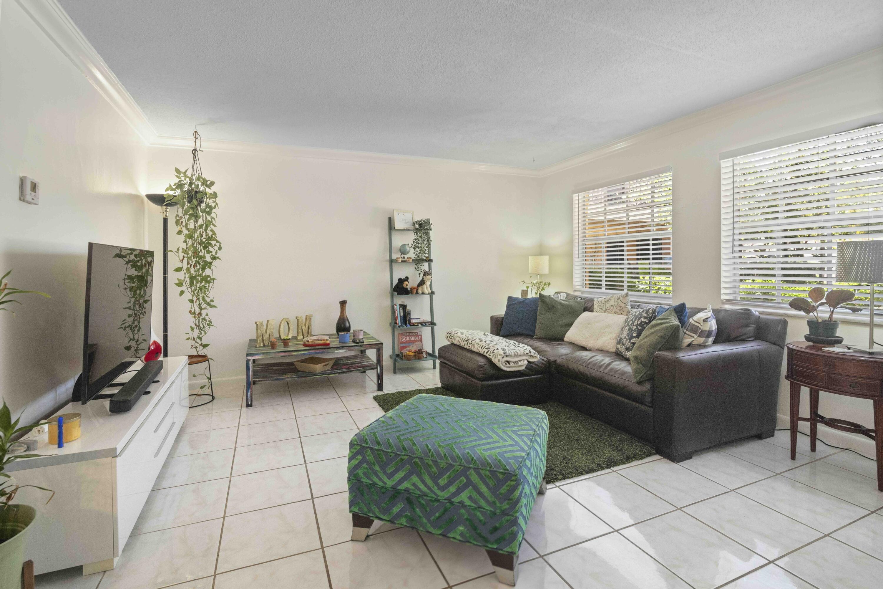 1545 Miami Road Fort Lauderdale, FL 33316 - Photo 33 of 39 a living room with furniture and a flat screen tv