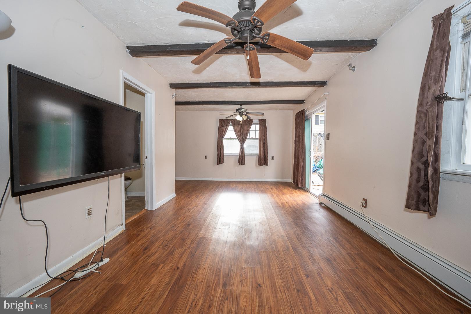 22 Delmont Road Newtown Square, PA 19073 - Photo 17 of 35 a view of a livingroom with furniture wooden floor and windows
