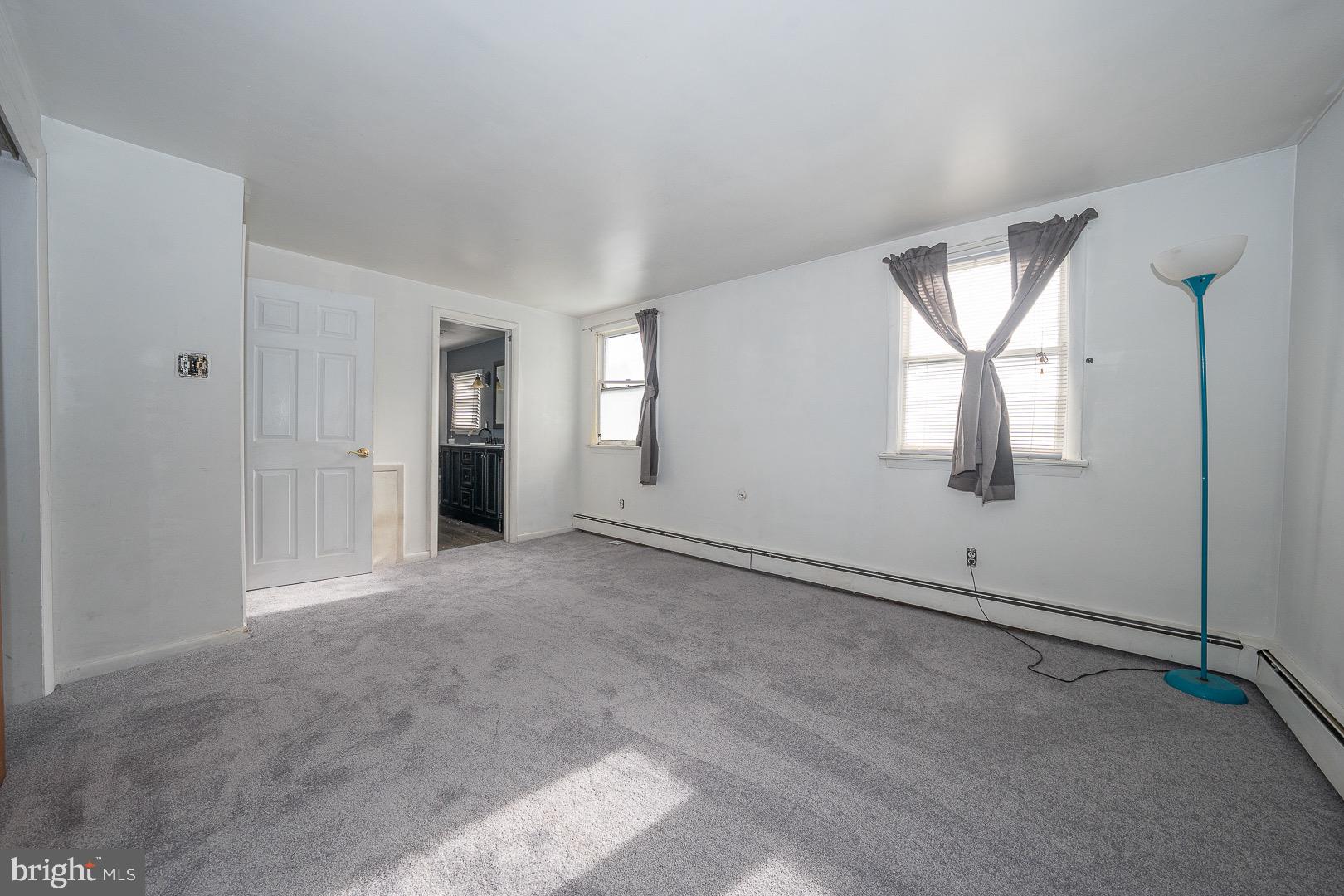 22 Delmont Road Newtown Square, PA 19073 - Photo 23 of 35 an empty room with windows and closet