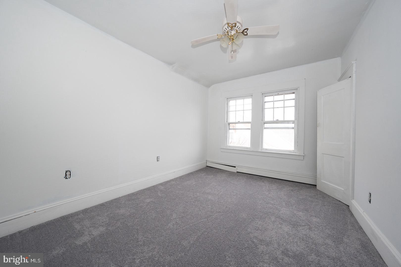 22 Delmont Road Newtown Square, PA 19073 - Photo 28 of 35 wooden floor in an empty room with a window