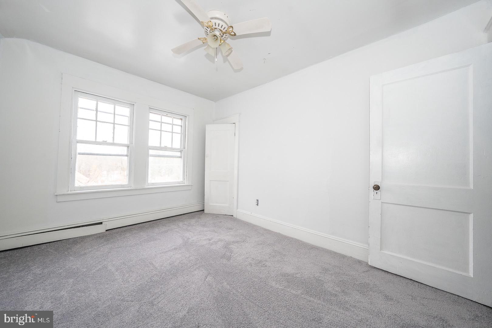 22 Delmont Road Newtown Square, PA 19073 - Photo 29 of 35 a view of an empty room with a window