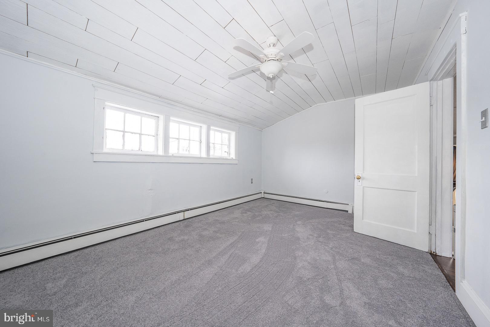 22 Delmont Road Newtown Square, PA 19073 - Photo 31 of 35 an empty room with a empty space and windows