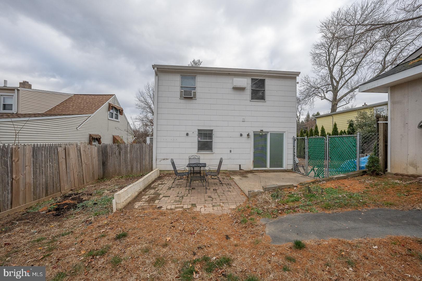 22 Delmont Road Newtown Square, PA 19073 - Photo 33 of 35 a front view of a house with a yard and garage