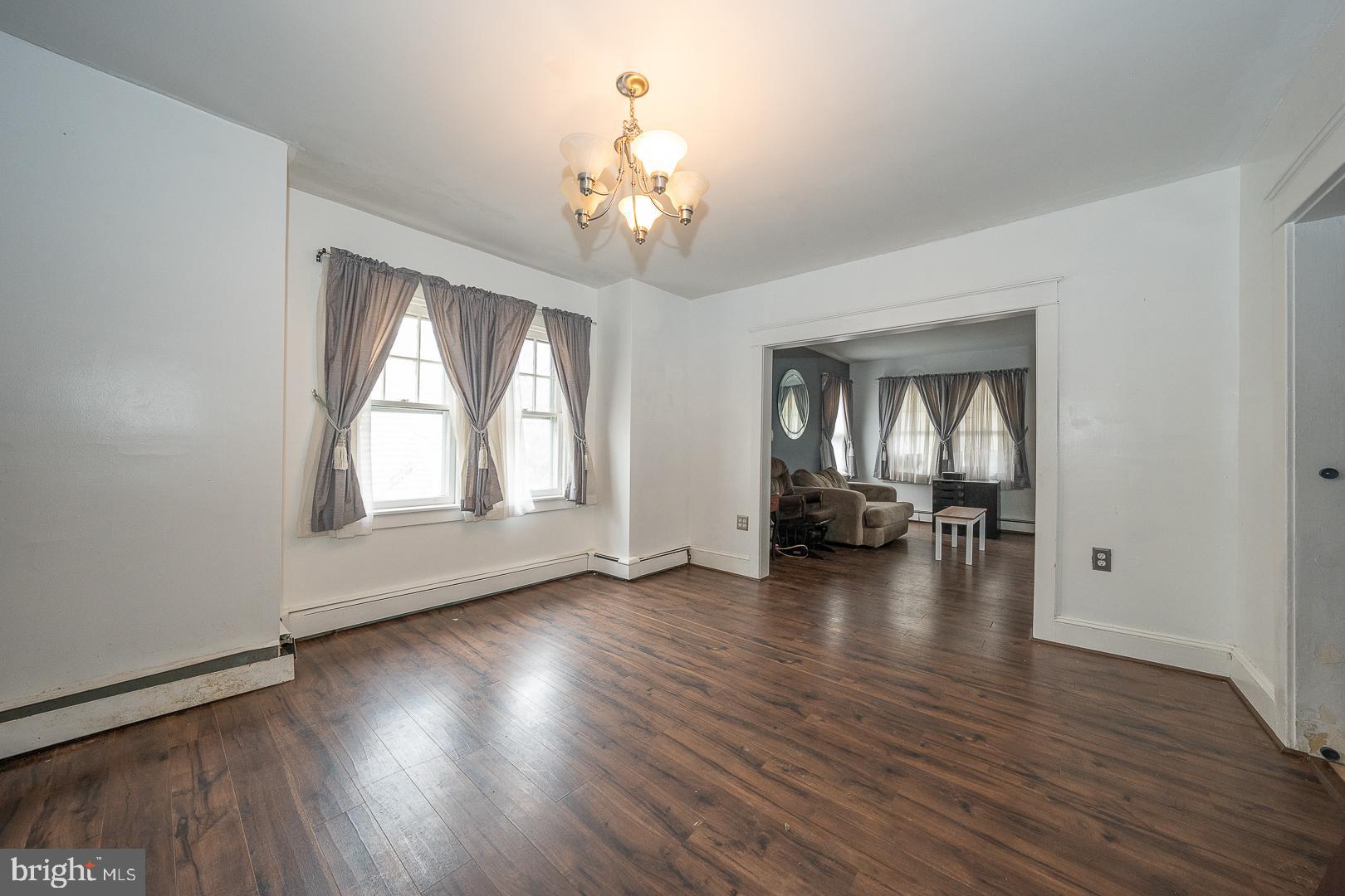 22 Delmont Road Newtown Square, PA 19073 - Photo 10 of 35 an empty room with wooden floor and windows
