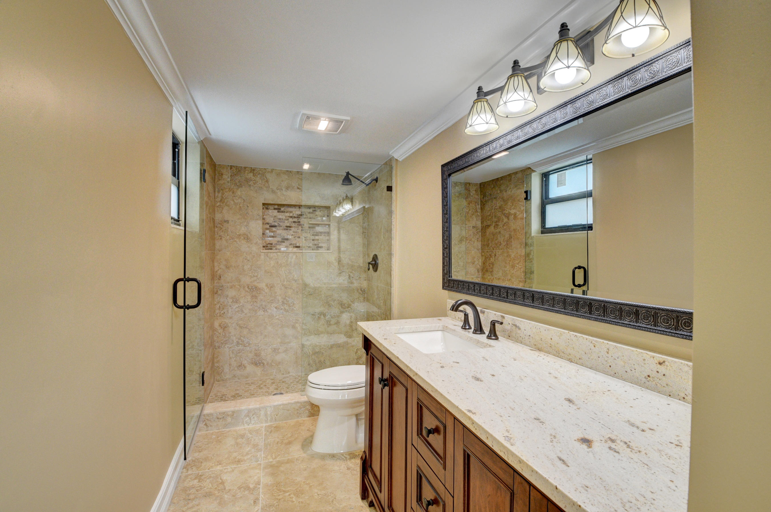 3111 Southwest 20th Terrace, Unit 22D1 Delray Beach, FL 33445 - Photo 16 of 23 Guest Bath