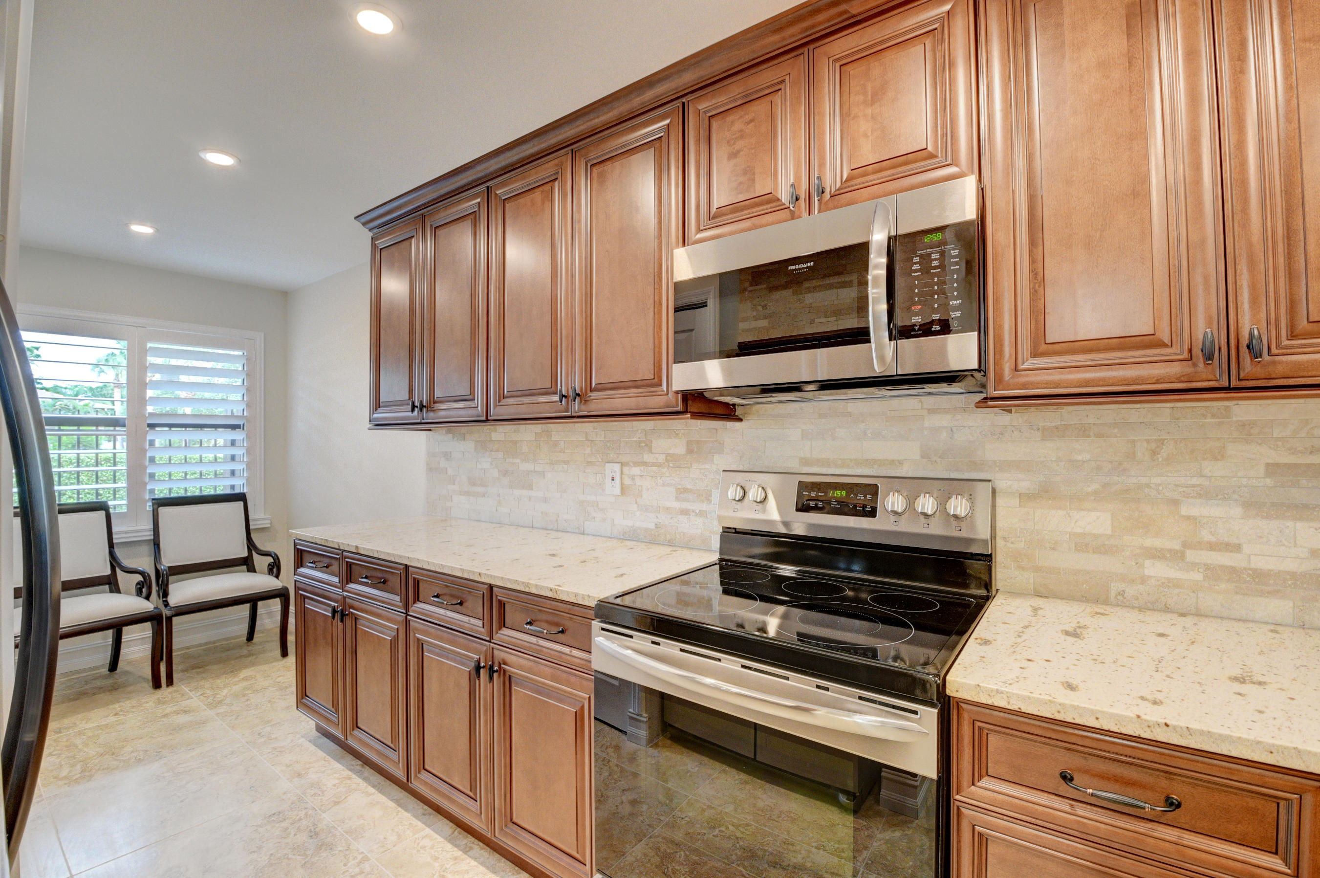 3111 Southwest 20th Terrace, Unit 22D1 Delray Beach, FL 33445 - Photo 3 of 23 Kitchen