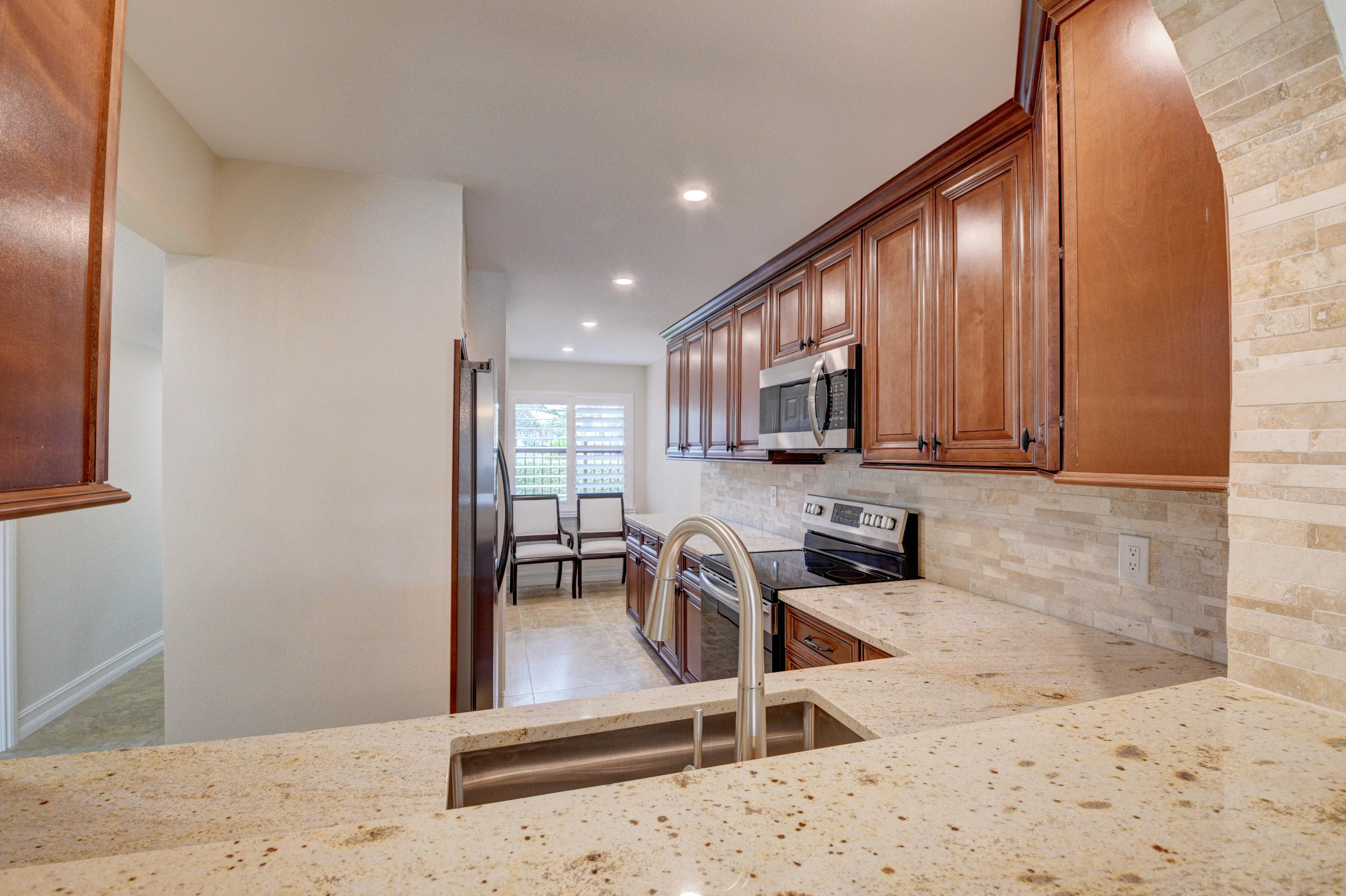 3111 Southwest 20th Terrace, Unit 22D1 Delray Beach, FL 33445 - Photo 5 of 23 Kitchen