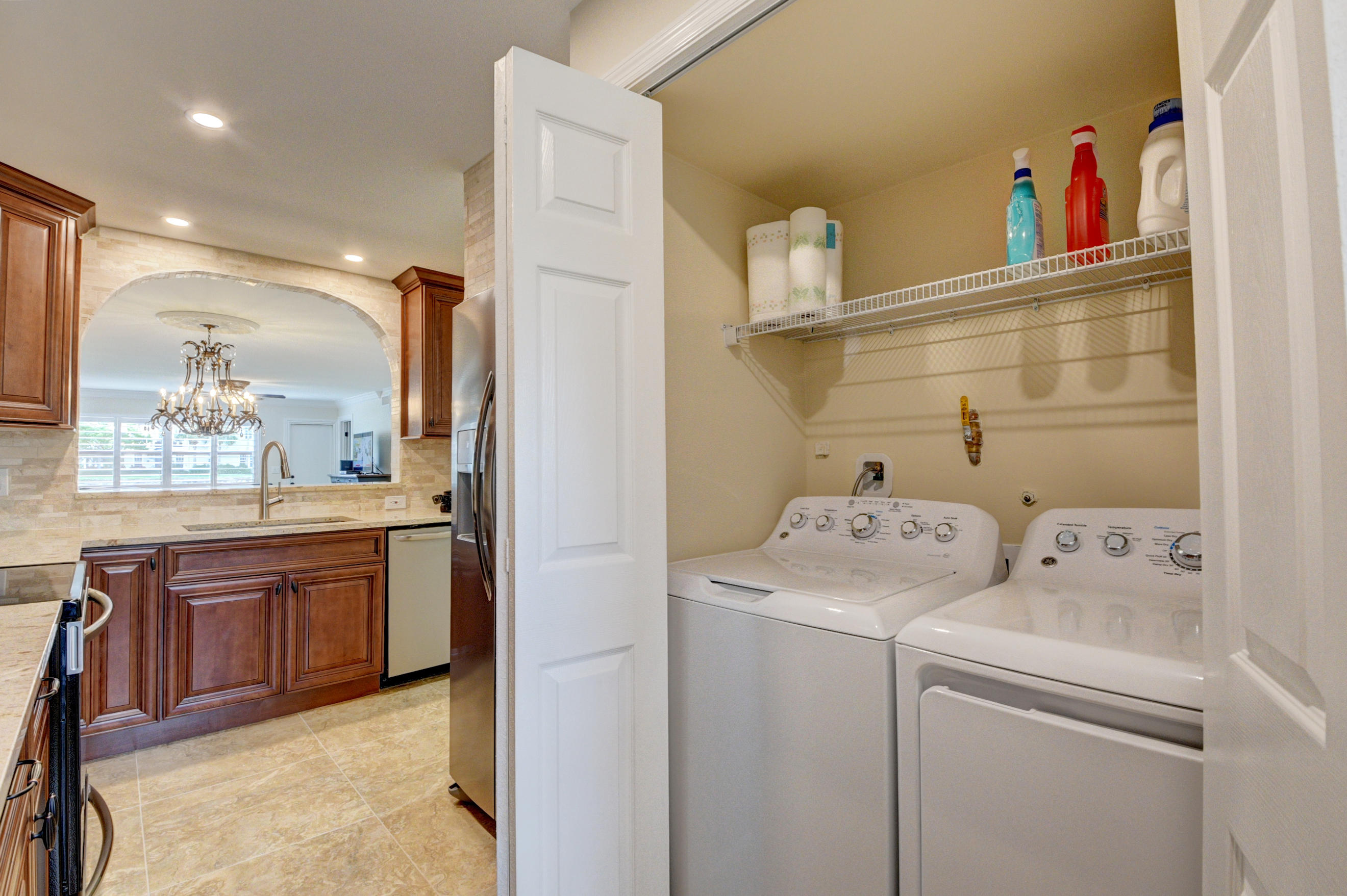 3111 Southwest 20th Terrace, Unit 22D1 Delray Beach, FL 33445 - Photo 10 of 23 Laundry off Kitchen