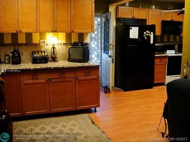 a view of street with tall buildings