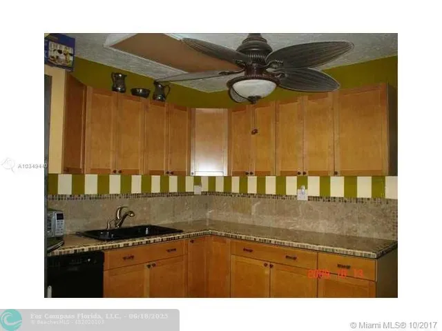 a black and white photo of a house