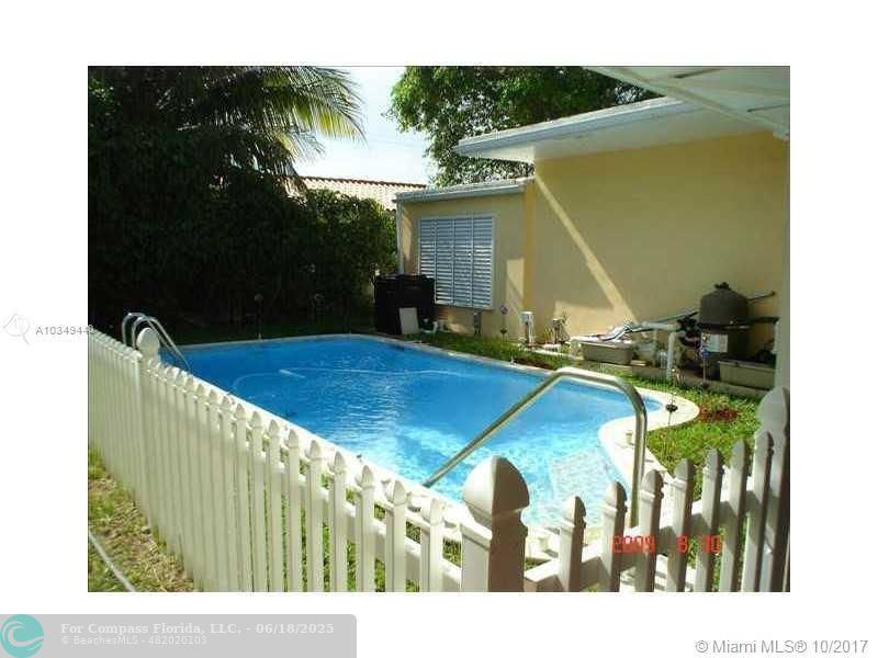 9324 Abbott Avenue Surfside, FL 33154 - Photo 20 of 33 a view of swimming pool with a patio