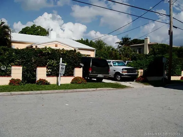 a view of street with sitting area