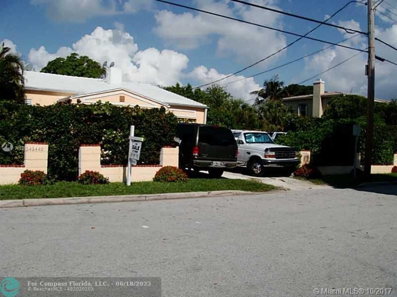 9324 Abbott Avenue Surfside, FL 33154 - Photo 28 of 33 a view of street with tall buildings