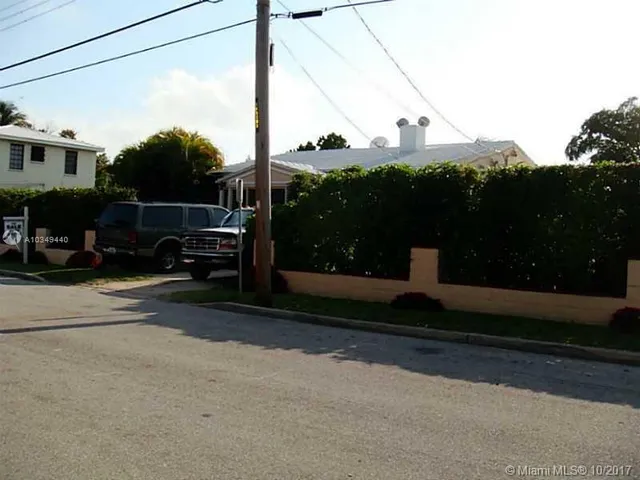 a view of street from balcony