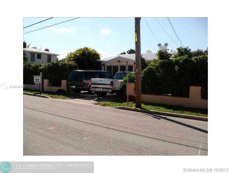 9324 Abbott Avenue Surfside, FL 33154 - Photo 32 of 33 a black and white photo of a house