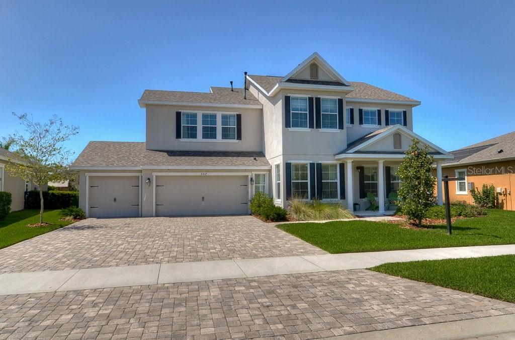 5317 Sanderling Ridge Drive Lithia, FL 33547 - Photo 1 of 1 The moment you drive up to beautiful Cardel home you will be captivated by southern charm elevation, pavered drive & walkway, plus columned front porch!