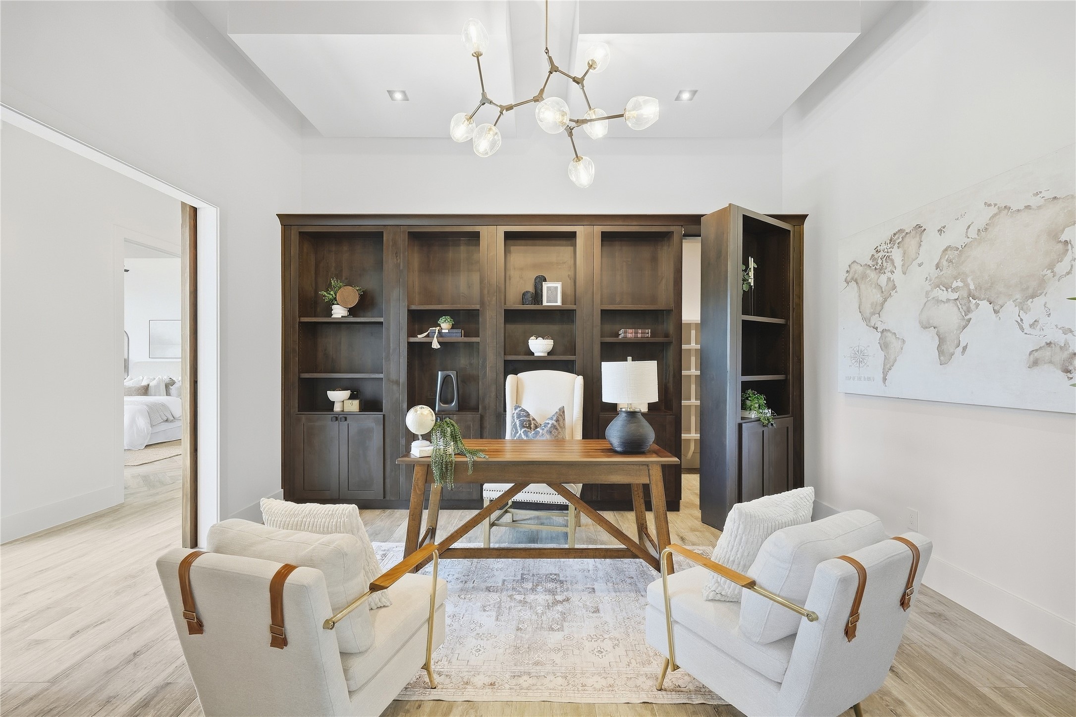 449 Ranch Falls Fair Oaks Ranch, TX 78015 - Photo 25 of 39 Rich wood built-ins and a tray ceiling define this elegant modern study.