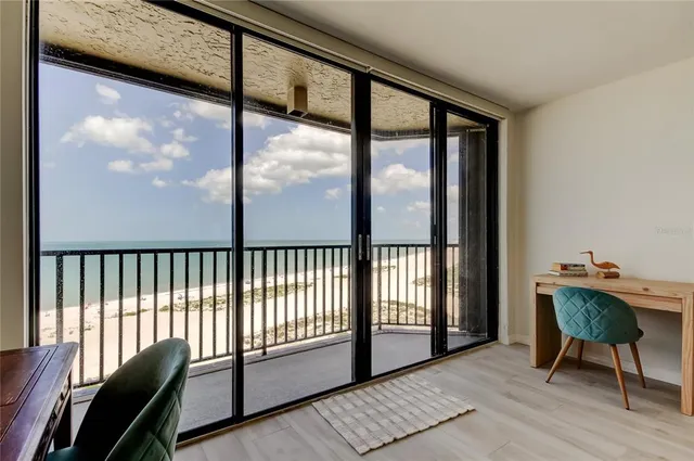 a view of a room with a balcony