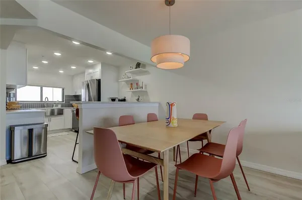 a view of a dining room with furniture