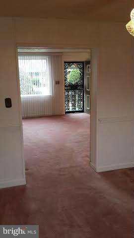 1224 Kevin Road Baltimore, MD 21229 - Photo 2 of 11 an empty room with windows