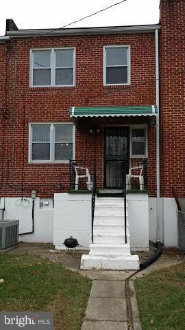 1224 Kevin Road Baltimore, MD 21229 - Photo 10 of 11 a front view of a house with garden