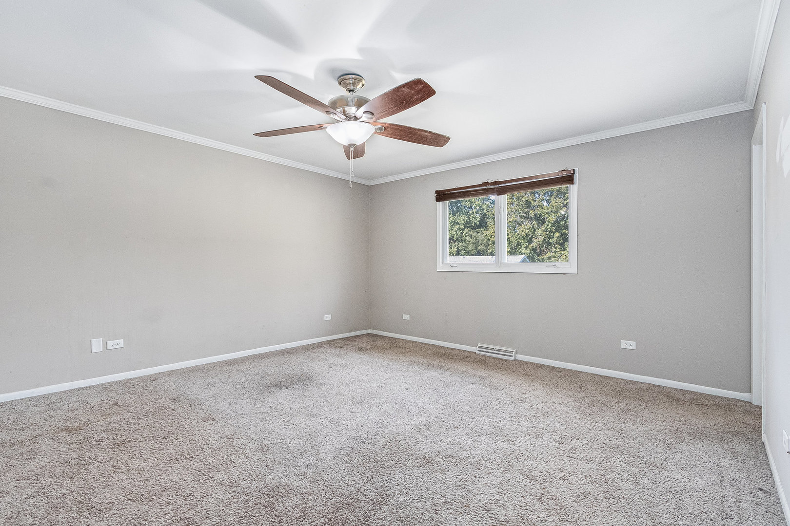 311 West Michigan Road New Lenox, IL 60451 - Photo 7 of 16 a view of an empty room with a window