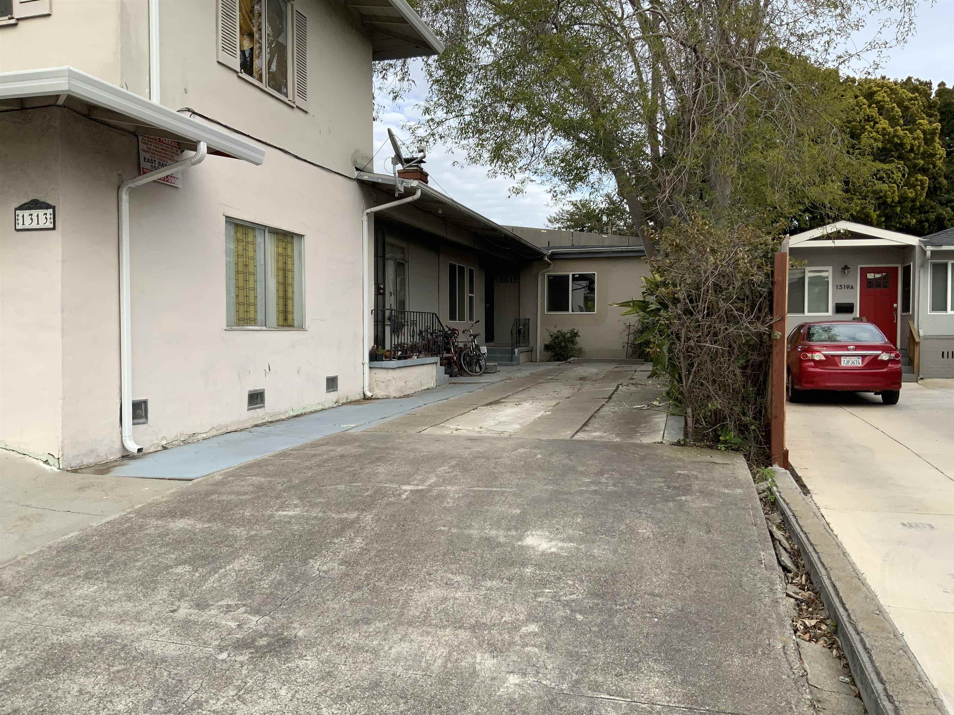 a view of a car in front of a house