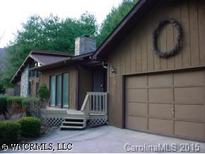 115 Laurel Branch Road Maggie Valley, NC 28751 - Photo 2 of 8 a view of a house with a small backyard