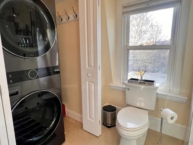 a bathroom with a toilet and a sink