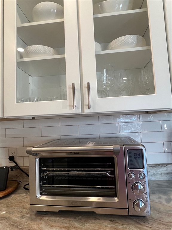 17 Emerson Street, Unit 2 Wakefield, MA 01880 - Photo 5 of 22 a bathroom with a stove and a sink