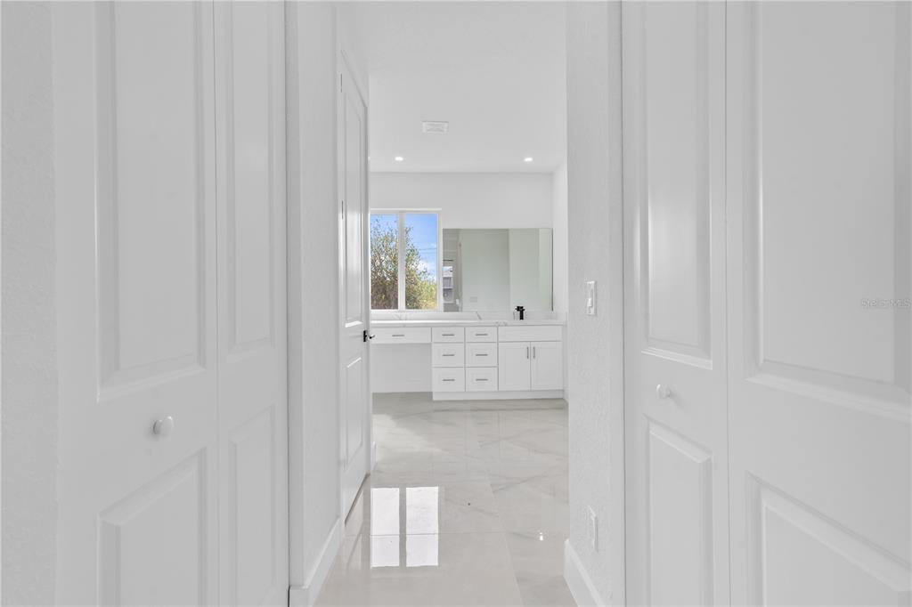 13438 Mc Intosh Avenue Port Charlotte, FL 33981 - Photo 21 of 46 a bathroom with a shower and a sink